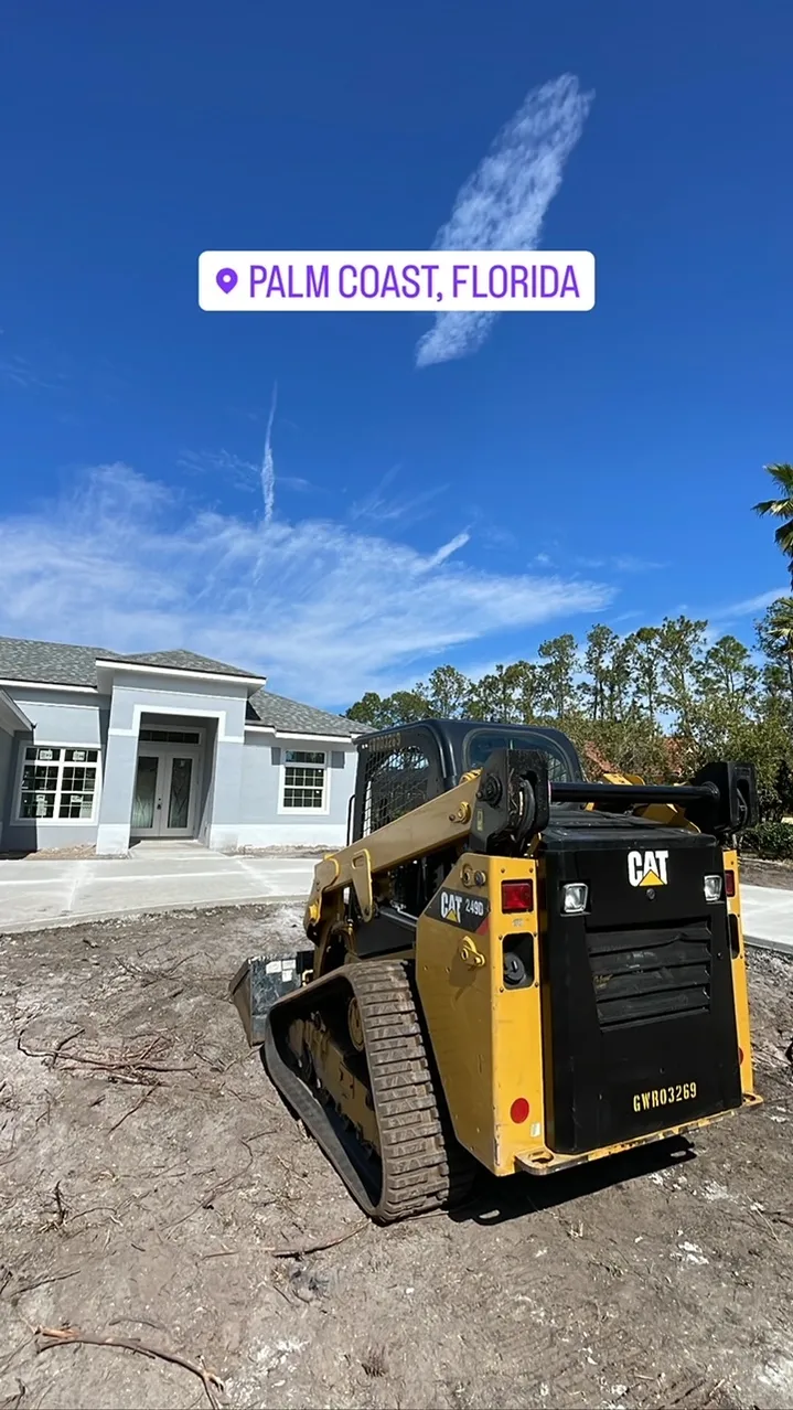 A skid steer at a site.
