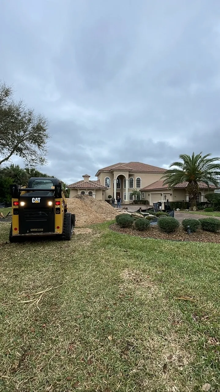 Equipment on grass at a residential property.