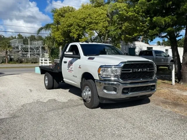 A branded Dump Xperts work truck